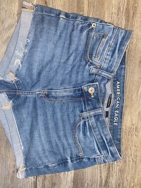 American Eagle Outfitters Slim Jeans in Medium Blue with Tan Stitching